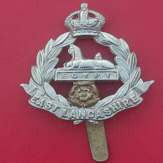 The East Lancashire Regiment - King's Crown Bi Metal Cap Badge.