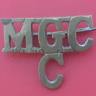 The Machine Gun Corps (Cavalry) - Cast Brass Shoulder Title.