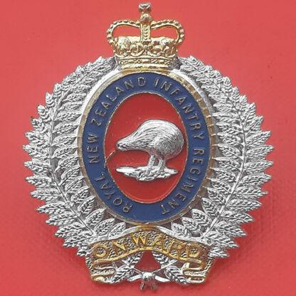 (New Zealand) Royal New Zealand Infantry Regiment - Gold & Silver Anodised Cap Badge.