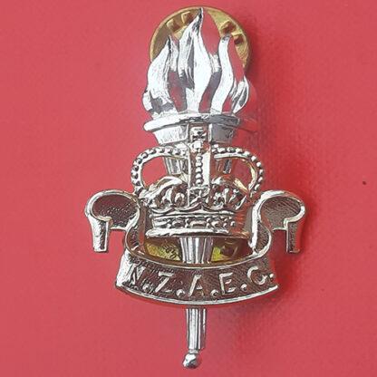 (New Zealand) New Zealand Army Education Corps - Gold & Silver Anodised Cap Badge.
