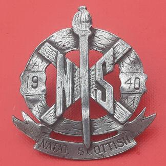 (South Africa) The Natal Scottish - White Metal ( Zinc?) Cap Badge.