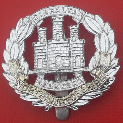 The Northamptonshire Regiment (T&S) - Gold & Silver Anodised Cap Badge.