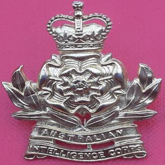 (Australia) The Australian Intelligence Corps - Queen's Crown Gilding Metal Cap Badge.