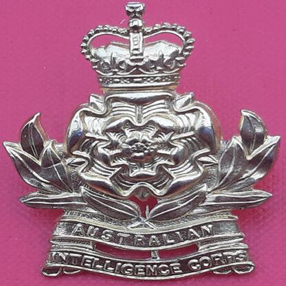 (Australia) The Australian Intelligence Corps - Queen's Crown Gilding Metal Cap Badge.