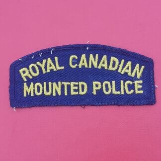 (Canada) The Royal Canadian Mounted Police - Woven Cloth Shoulder Title.