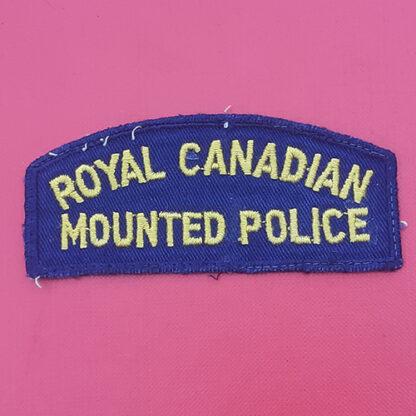 (Canada) The Royal Canadian Mounted Police - Woven Cloth Shoulder Title.