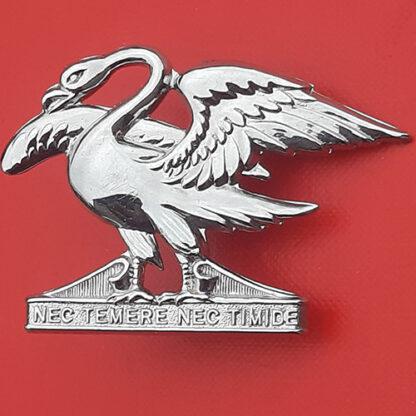 (South Africa)  Regiment Springs - Chromed Cap Badge.