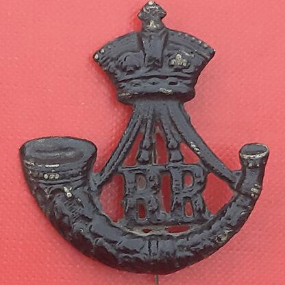(India) 6th Rajputana Rifles - King's Crown Blackened Brass Cap Badge.