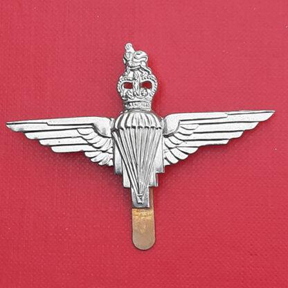 The Parachute Regiment -  Queen's Crown White Metal Cap Badge.