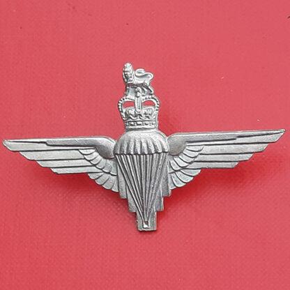 The Parachute Regiment -  Queen's Crown White Metal Cap Badge.