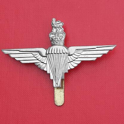 The Parachute Regiment -  Queen's Crown White Metal Cap Badge.