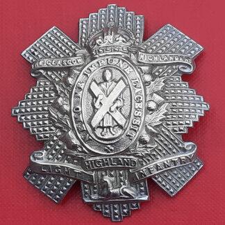 The Glasgow Highlanders Highland Light Infantry - King's Crown White Metal Cap Badge.