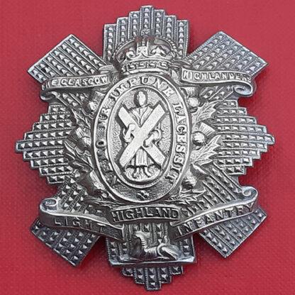 The Glasgow Highlanders Highland Light Infantry - King's Crown White Metal Cap Badge.