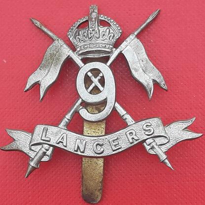 The 9th Lancers - King's Crown White Metal Cap Badge.