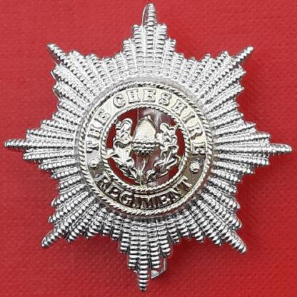 The Cheshire Regiment - Gold & Silver Anodised Cap Badge.
