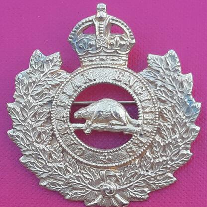 (Canada) Canadian Engineers - King's Crown Pin Backed Gilt Cap Badge.