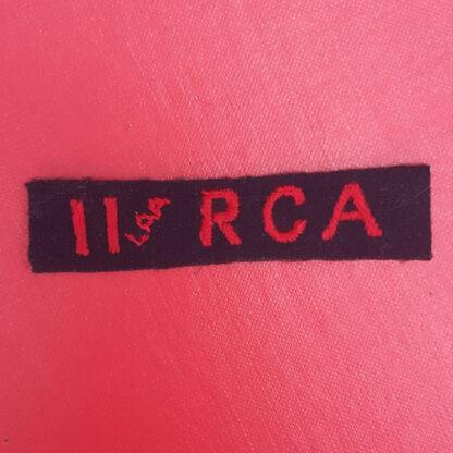 (Canada) 11th Light Anti Aircraft Royal Canadian Artillery - Cloth Shoulder Title.