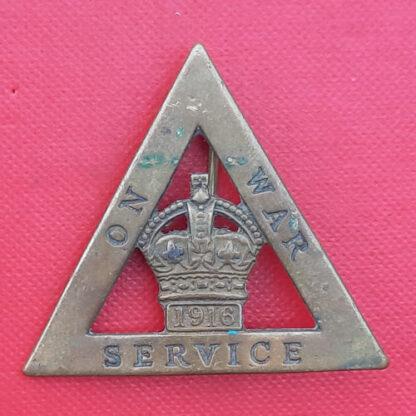 Women's " On War Service" 1916 - Gilding Metal Pin Backed Badge.