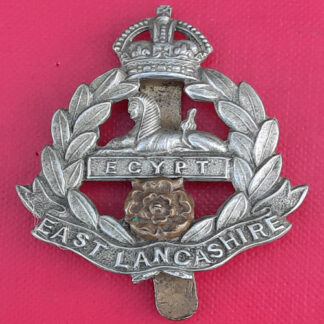 The East Lancashire Regiment - King's Crown Bi Metal Cap Badge.