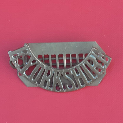 The East Yorkshire Regiment - Gilding Metal Shoulder Title.