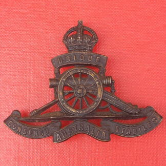 (Australia) The Royal Australian Artillery - King's Crown Blackened Brass Cap Badge.