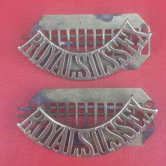 The Royal Sussex Regiment - Gilding Metal Shoulder Titles.