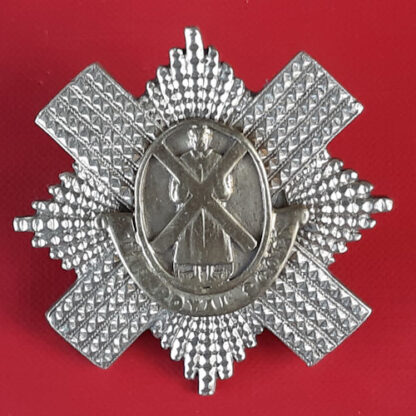 The Royal Scots - Piper's Bi Metal Cap Badge.