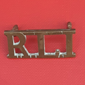 (South Africa) The Rand Light Infantry - Gilding Metal Shoulder Title.