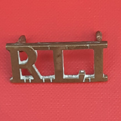 (South Africa) The Rand Light Infantry - Gilding Metal Shoulder Title.