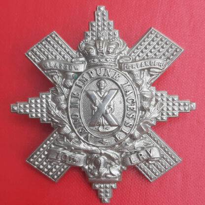 The 10th Lanarkshire Rifle Volunteers - Queen Victoria's Crown White Metal Cap Badge.