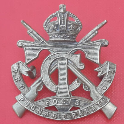 (South Africa) Transvaal Cadets - King's Crown White Metal Cap Badge.