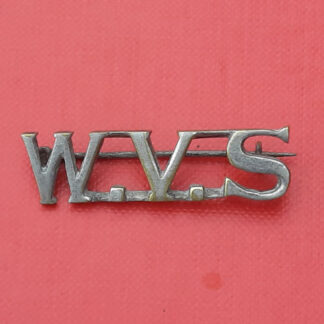 The Women's Volunteer Service - White Metal Pin Backed Shoulder Title.