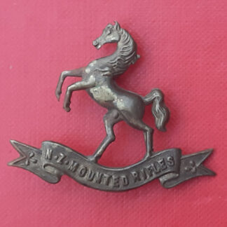 (New Zealand) The Mounted Rifles - Gilding Metal Cap Badge.