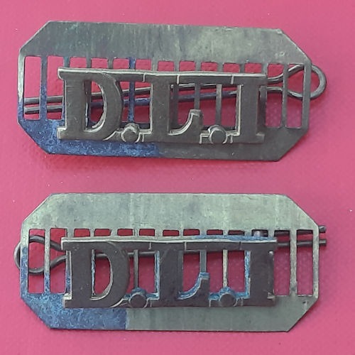 The Durham Light Infantry - Gilding Metal Shoulder Titles.