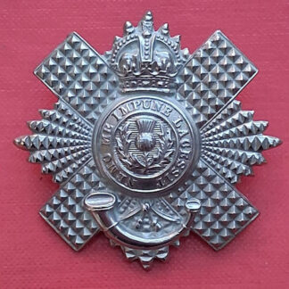 The 4th / 5th Royal Scots - King's Crown White Metal Cap Badge.