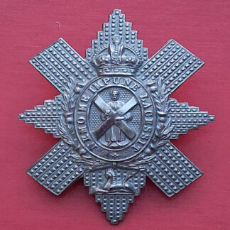 The Royal Highlanders (The Black Watch) - King's Crown White Metal Cap Badge.