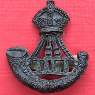 The Durham Light Infantry - WW2 Economy Issue Plastic Cap Badge.