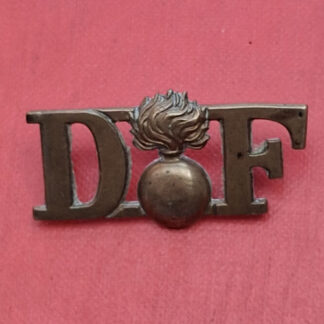 The Dublin Fusiliers - Gilding Metal Shoulder Title.