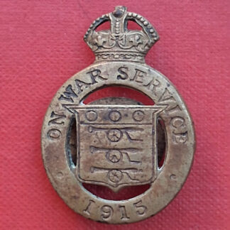 On War Service 1915 - Kings Crown Gilding Metal Button Hole Badge.