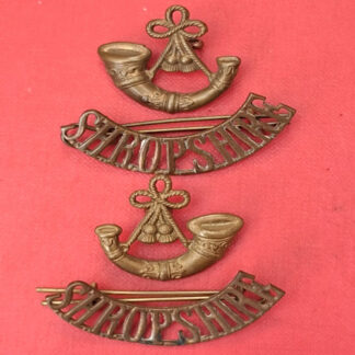The King's Shropshire Light Infantry - 2 Piece Gilding Metal Shoulder Title.