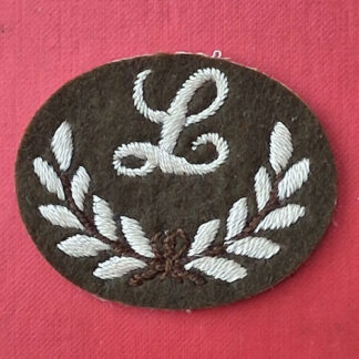 Gunlayer - Cloth Trade Badge.