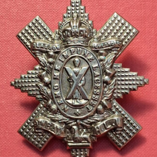 The 9th Battalion The Highland Light Infantry - King's Crown White Metal Cap Badge.