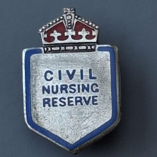 Civil Nursing Reserve - King's Crown Enamelled Pin Backed Badge.