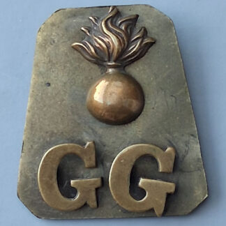 The Grenadier Guards - (1st Pattern) Gilding Metal Shoulder Title.