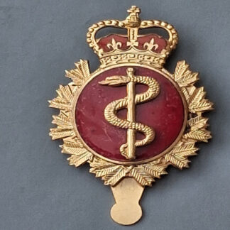 (Canada) The Royal Canadian Medical Forces - Queen's Crown Enamelled Cap Badge.