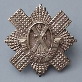 The Royal Scots - White Metal Piper's Cap Badge.