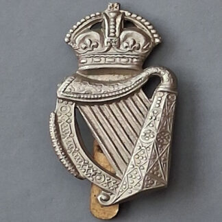 The 18th County Of London Battalion (London Irish Rifles) - King's Crown White Metal Cap Badge.