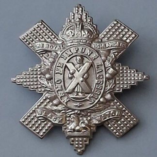 The Royal Highlanders (The Black Watch) - King's Crown White Metal Cap Badge.