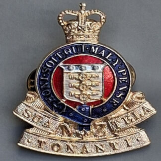 (New Zealand) The New Zealand Royal Army Ordnance Corps - Gold Pin Backed Anodised Cap Badge.