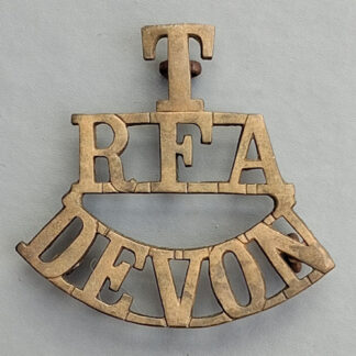 The Devonshire Royal Field Artillery Territorials - Gilding Metal Shoulder Title.